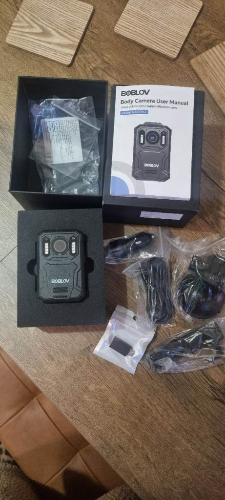 Body camera and body strap