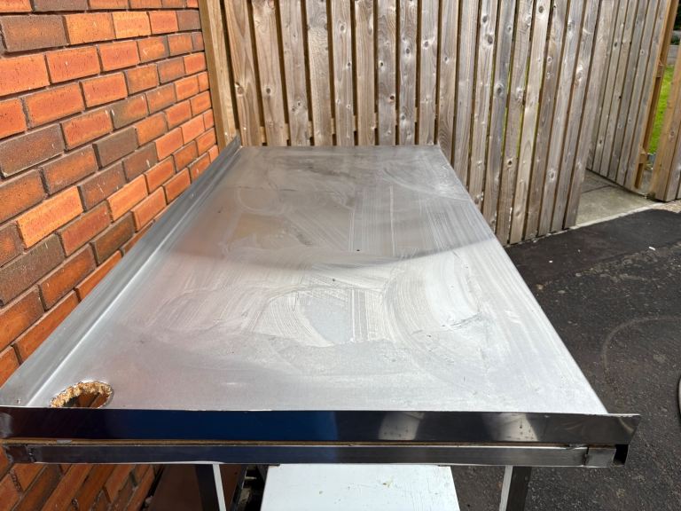 Steel table with under storage (3 available)