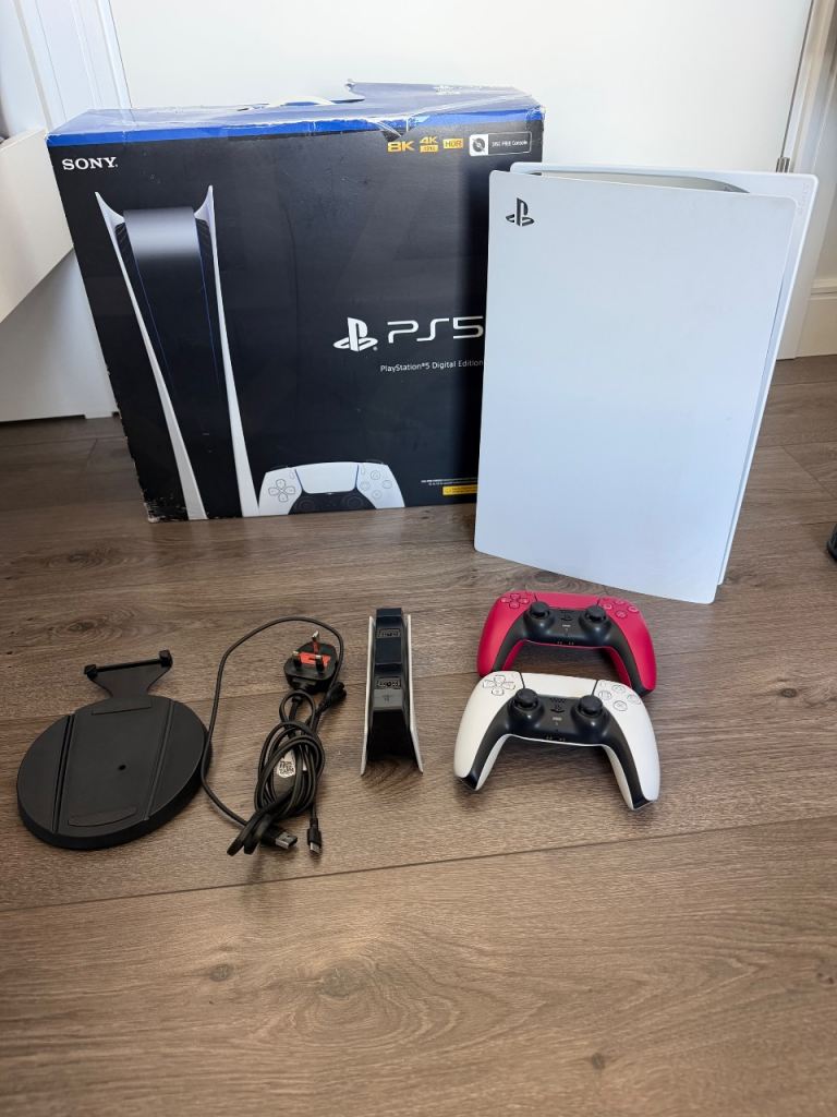 PS5 Digital Edition - Excellent Condition, 2 Controllers & Dual Charging Stand