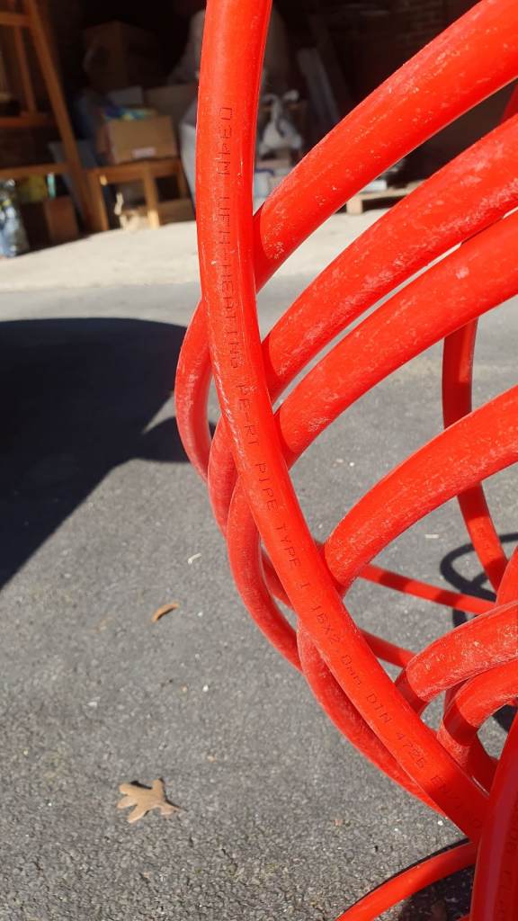 Castellated floor panels and UFH pipe