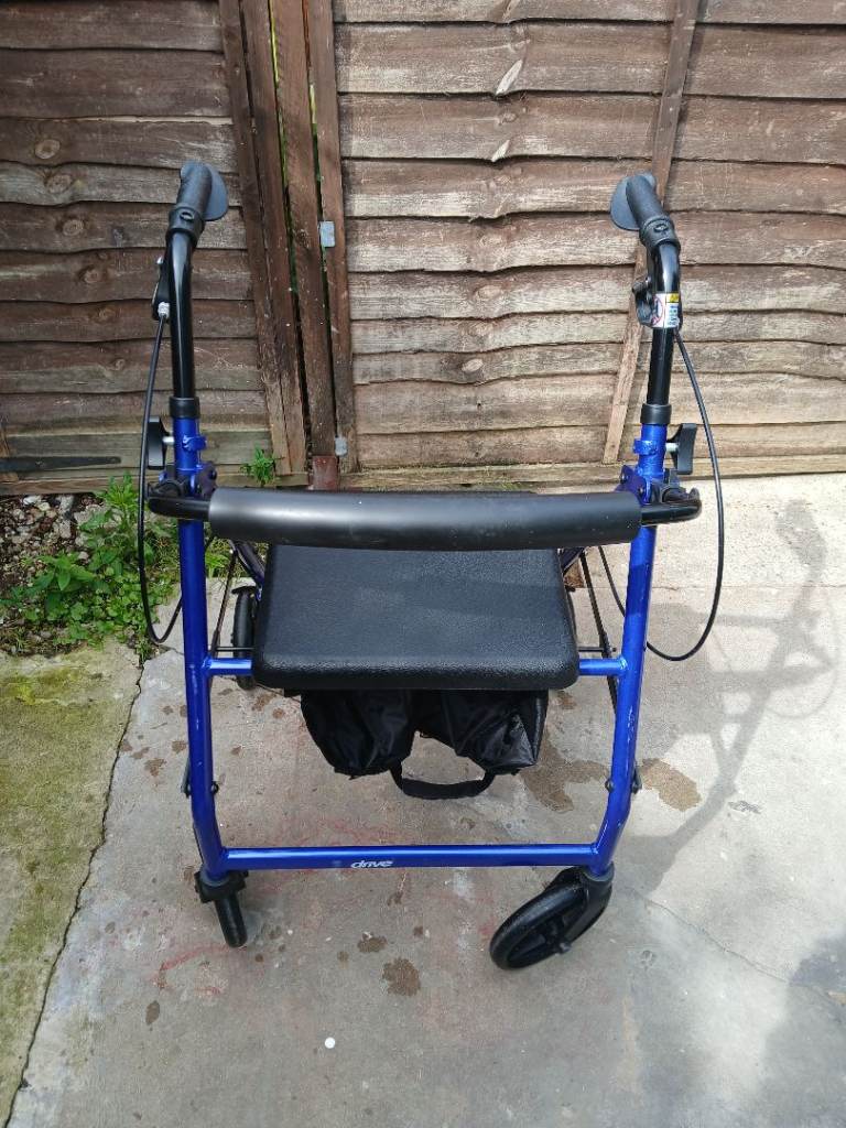 Blue 4 wheeled walker
