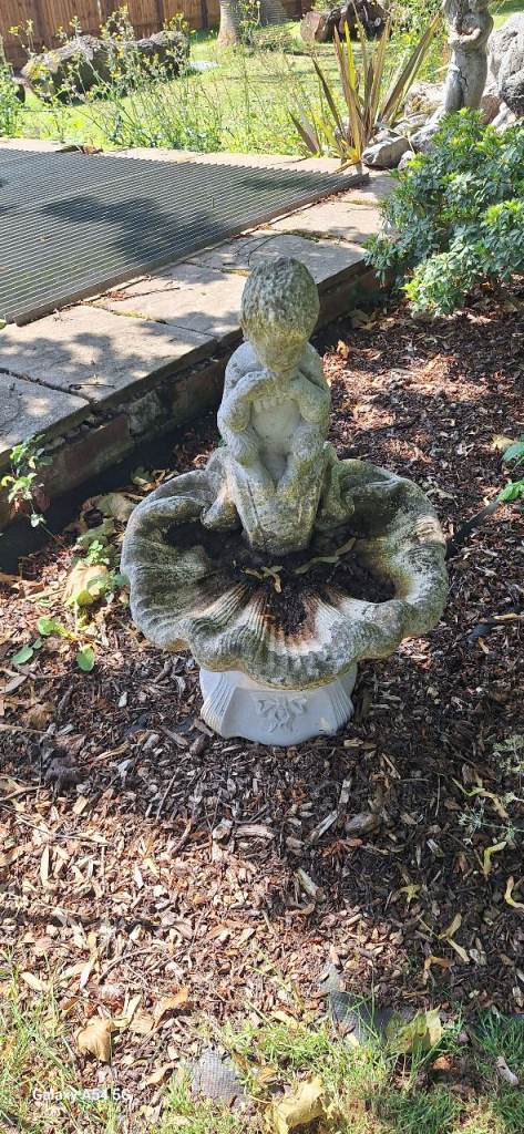 Beautiful statute stone Bird Bath