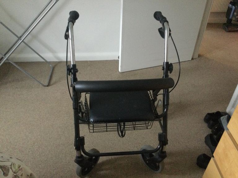 Mobility walker with seat and basket 