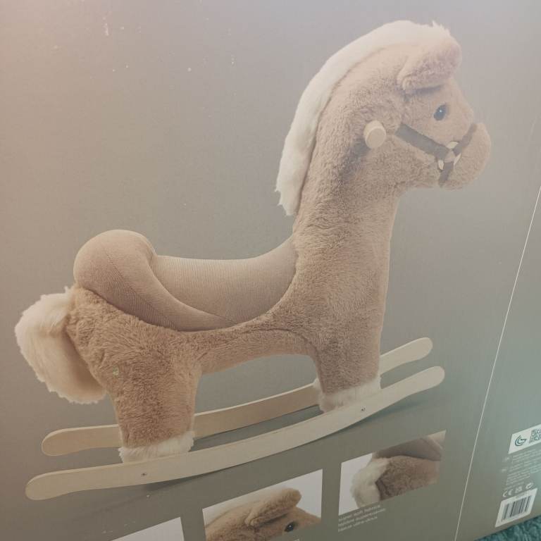 Mamas and papas rocking horse. Still in original box