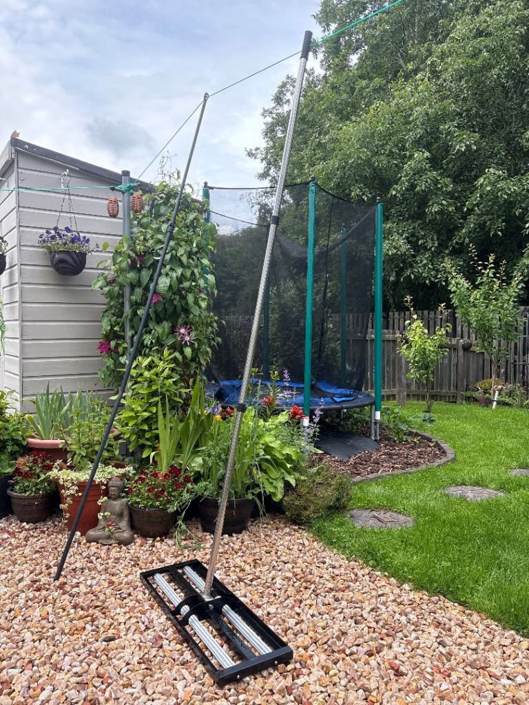 Soil spreader for lawn