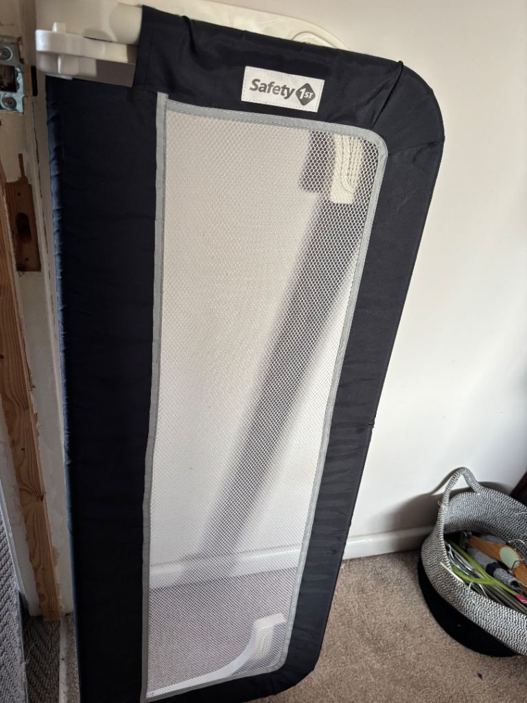 Navy blue Safety 1st toddler bed guard. 