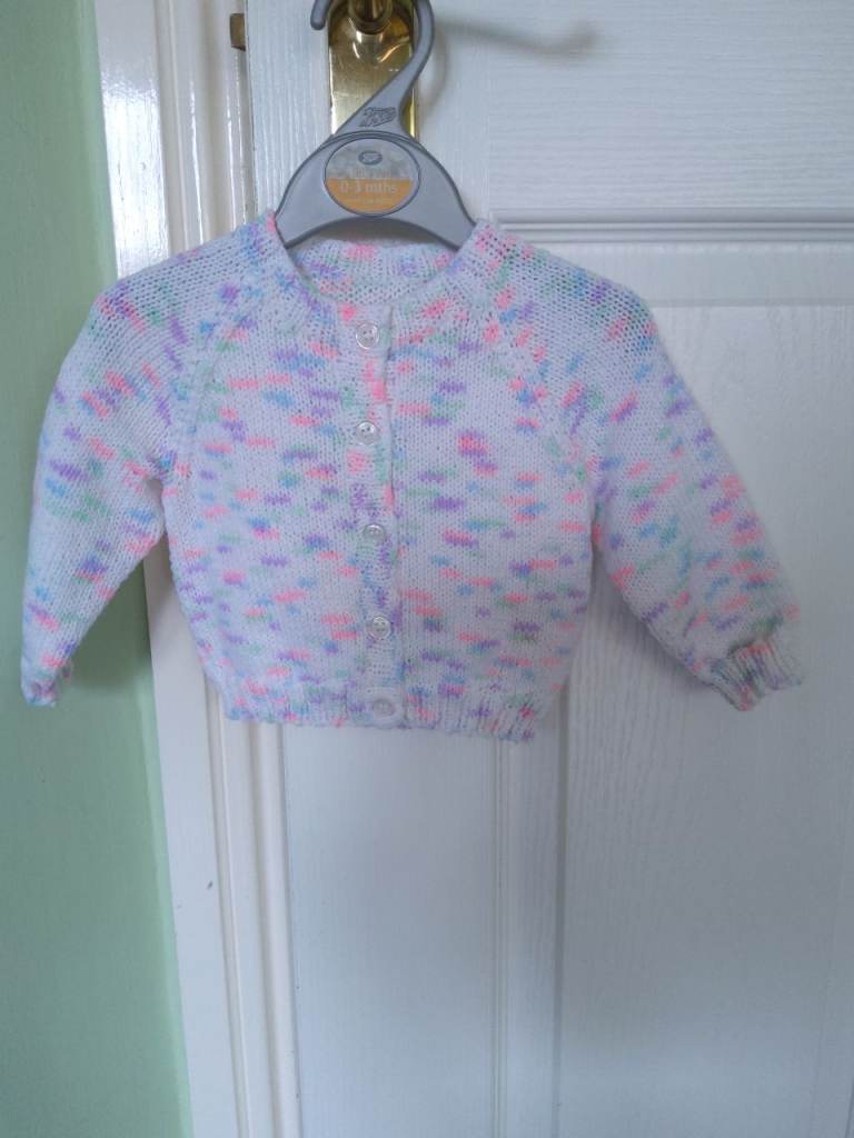 New, hand knitted baby cardigan 