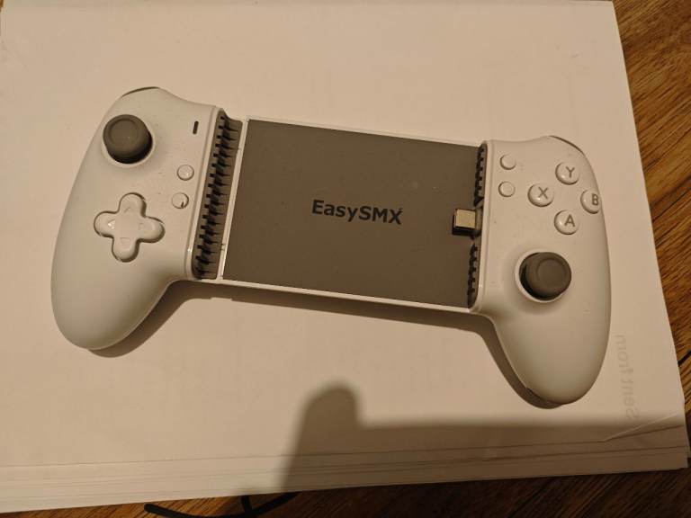 Mobile phone gaming controller 