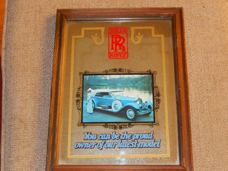 PAIR OF DIFFERENT VINTAGE ROLLS ROYCE MIRROR PICTURES