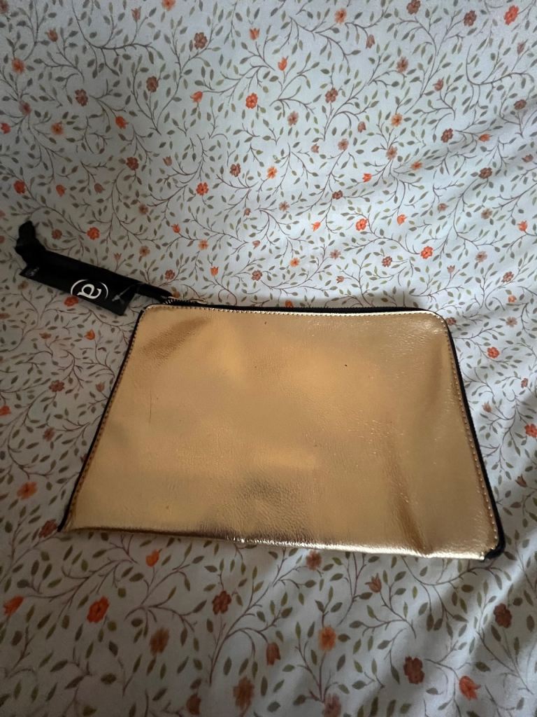 Golden clutch  Size 10” X 7”  New