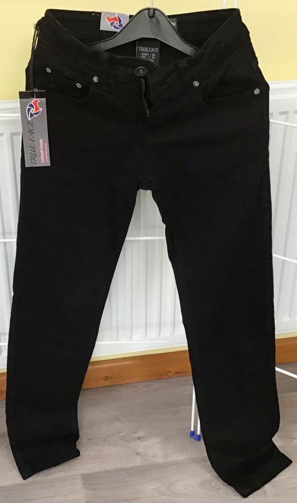 NEW black jeans, by True Face. With shop tag. Slim fit, stretch, 28” waist. BARGAIN !!