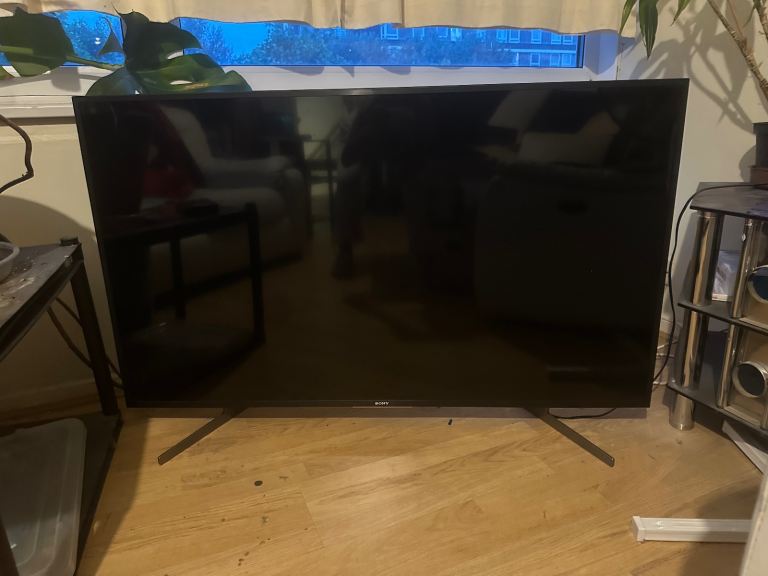 Large Black Flat Screen TV – Good Condition
