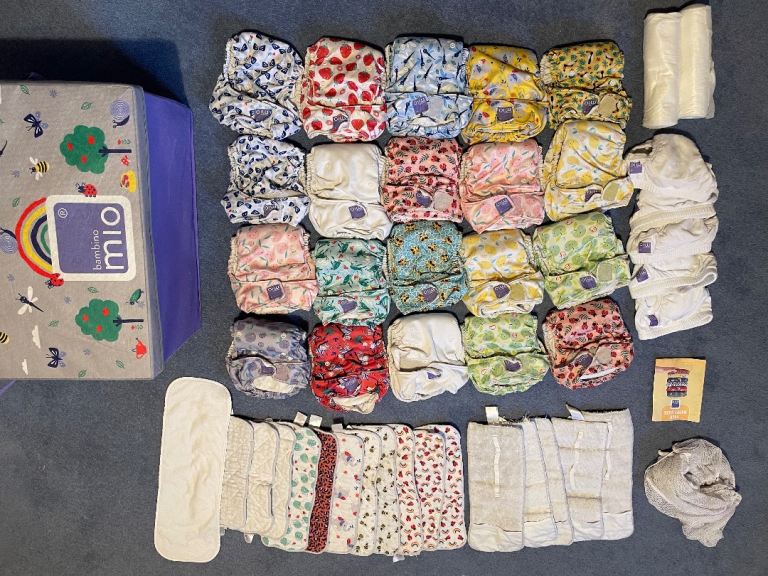 Large box of bambino mio resuable nappies + extras