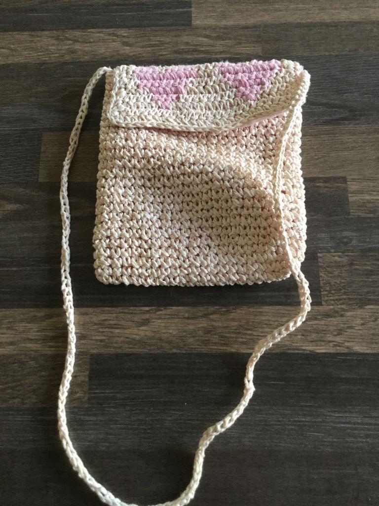 Pink little girls bag. Very cute with Velcro fastening. £1.