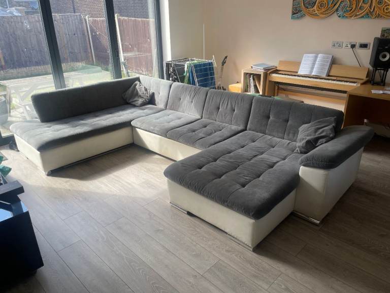 Large U-sofa with sofabed in faire condition. 