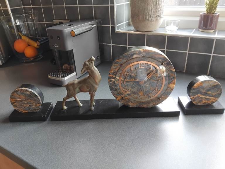 Art Deco clock and Garnitures. 
