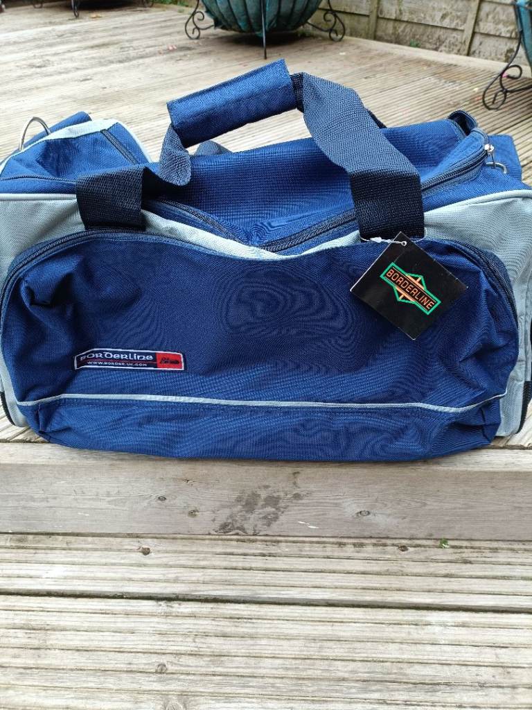 Brand new holdall in blue label still attached 