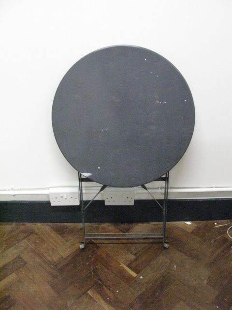 Folding Table . Round top . Made of metal
