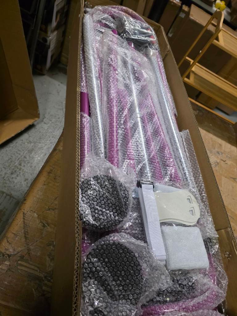 A new still boxed purple metal Gymnastics Bars it has ajustable hight 