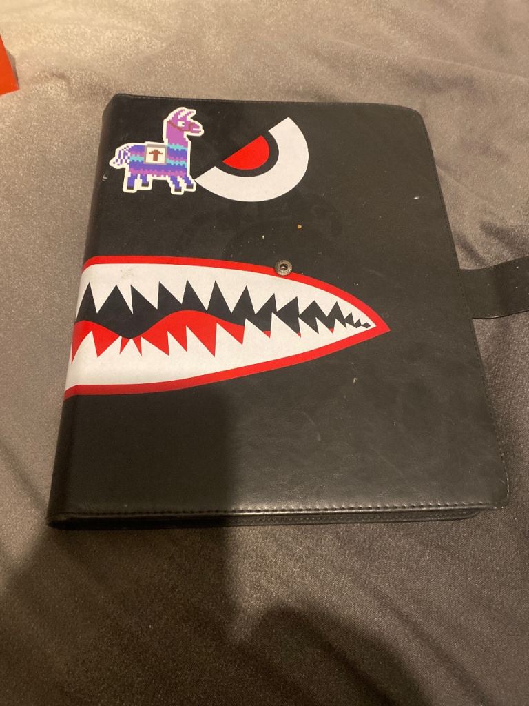 pokémon binder and battle ground with 2 jumbo packs