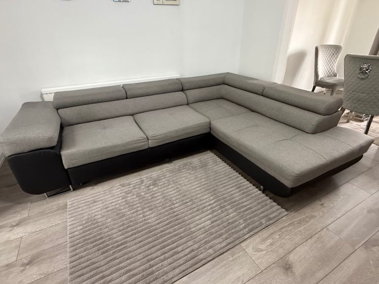 Corner sofa bed with storage grey