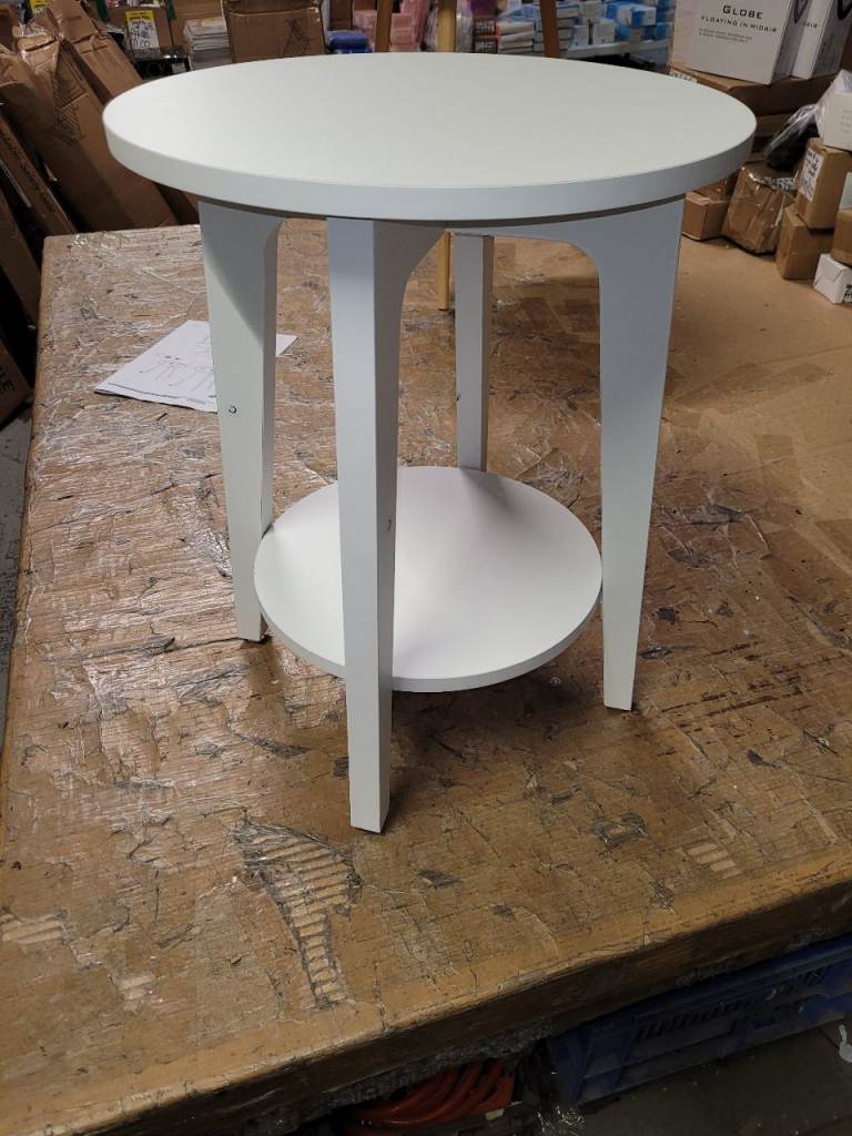 A new ( slight seconds) white finish round  Side Table with Bottom shelve .