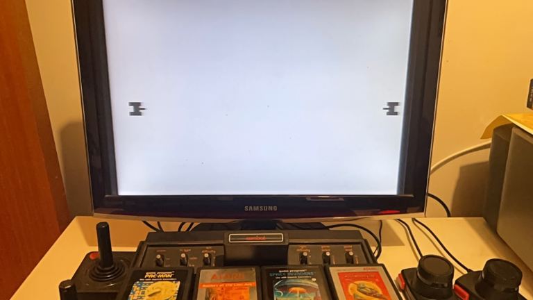 Atari 2600 with games and paddles