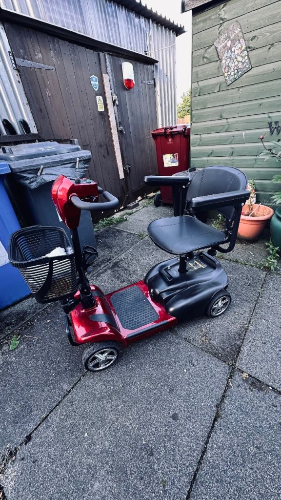 Red Mobility Scooter with Basket – Good Condition