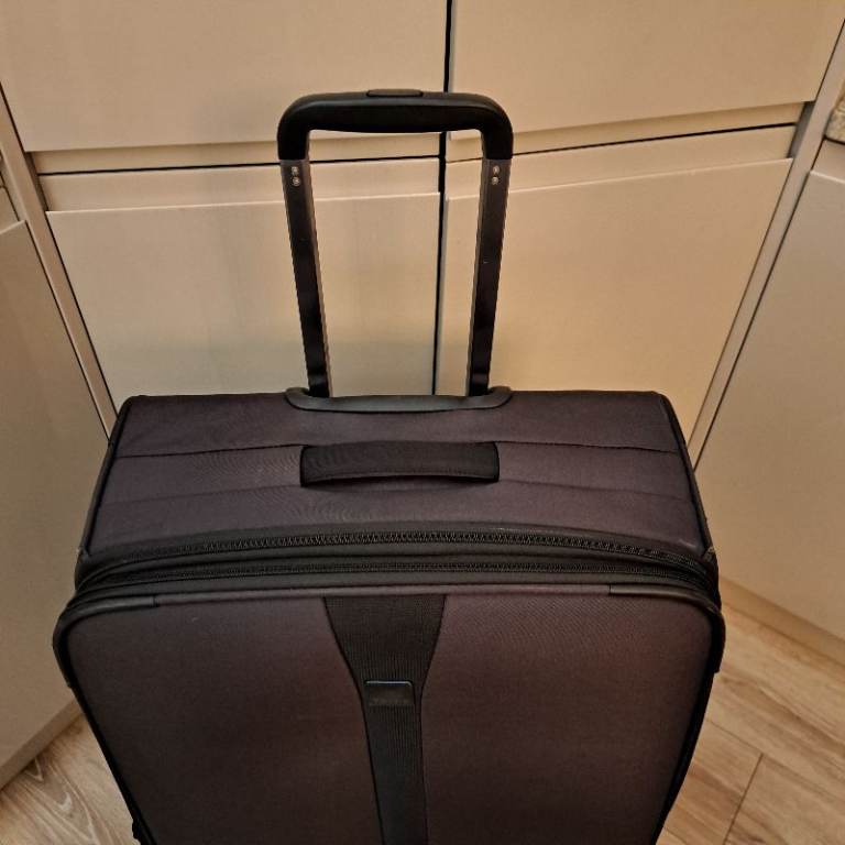 Two large Tripp suitcases
