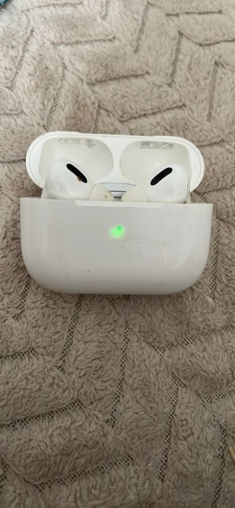 Apple AirPods Pro with Charging Case – Good Condition