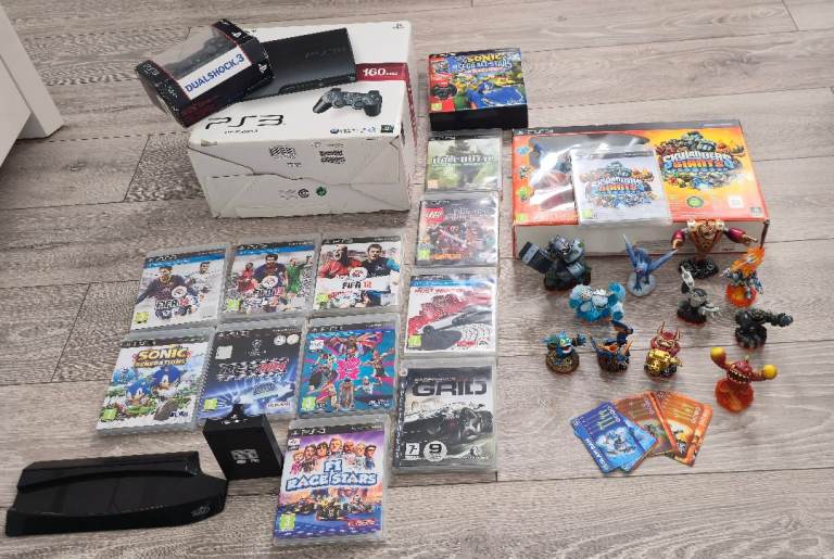 PS3 Playstation 3 slim 160gb/13 games/2 controllers/great condition 