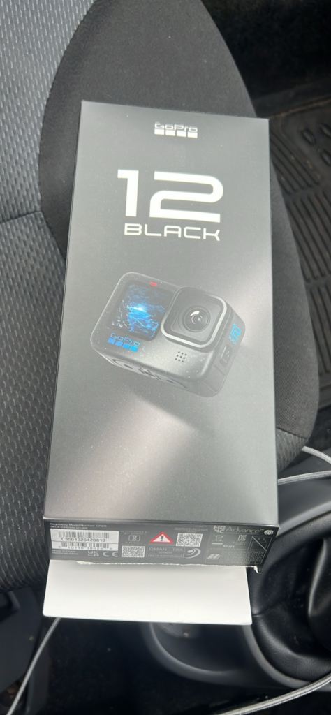 GoPro Hero 12 Black with SD card and headstrap. 