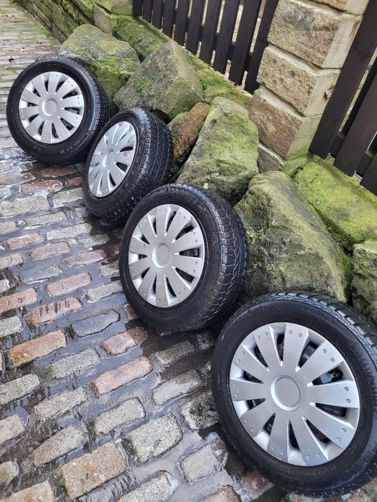 4x vauxhall corsa 4 stud steel wheels with 175 65 14 winter tyres 