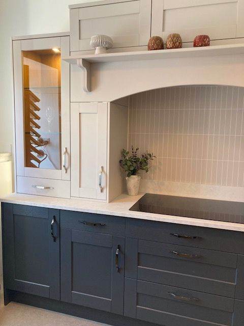 Modern Grey and White Kitchen Units with Integrated Wine Rack