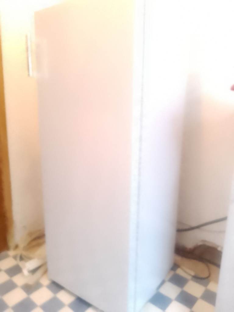White Tall Freestanding Freezer – Good Condition
