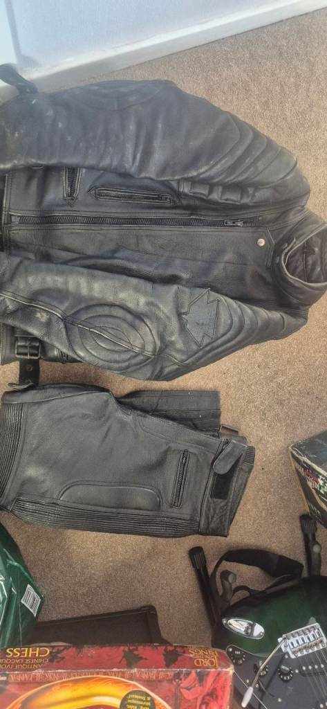 Motorcycle leather jacket and trousers 