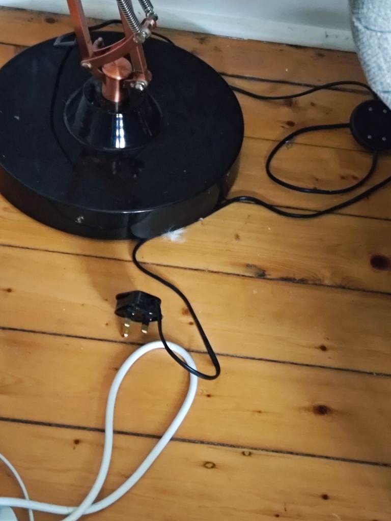 Floor lamp - black with copper accents - on trend industrial look