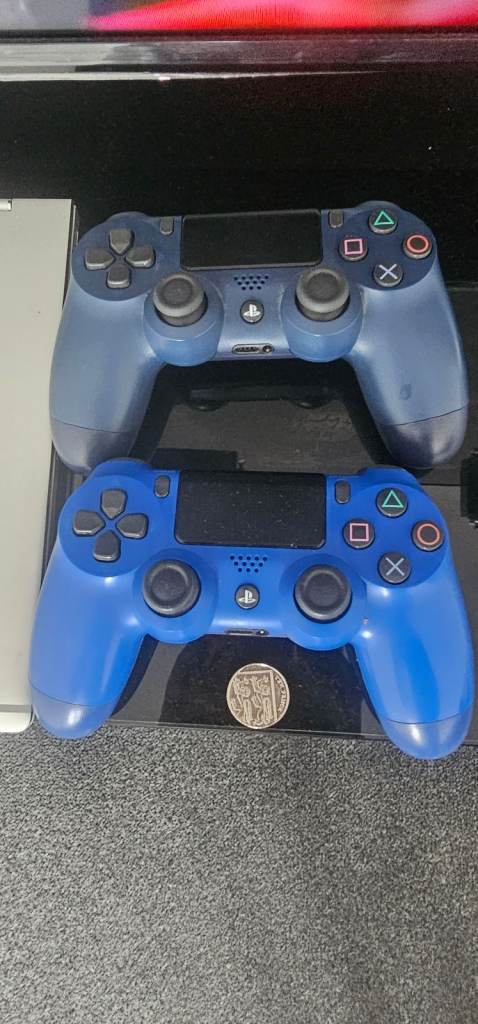 Sony PlayStation 4 Console with 2 Controllers and 6 Games