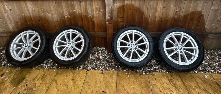 BMW 330e G20 genuine alloys with tyres.