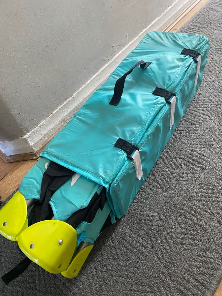 Free travel cot