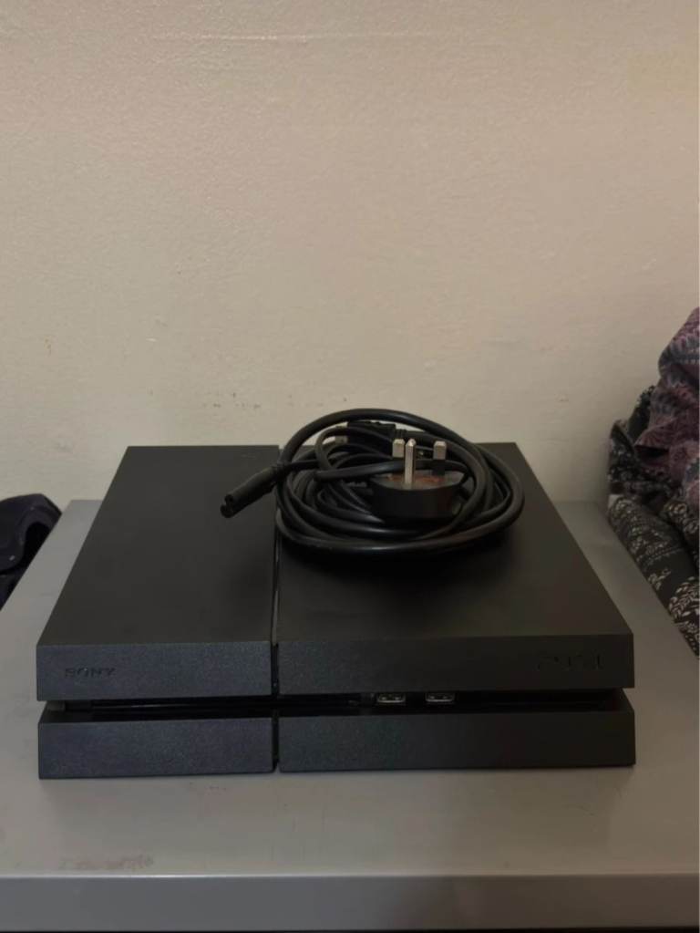 Sony PS4 1TB Jet Black – Excellent Condition