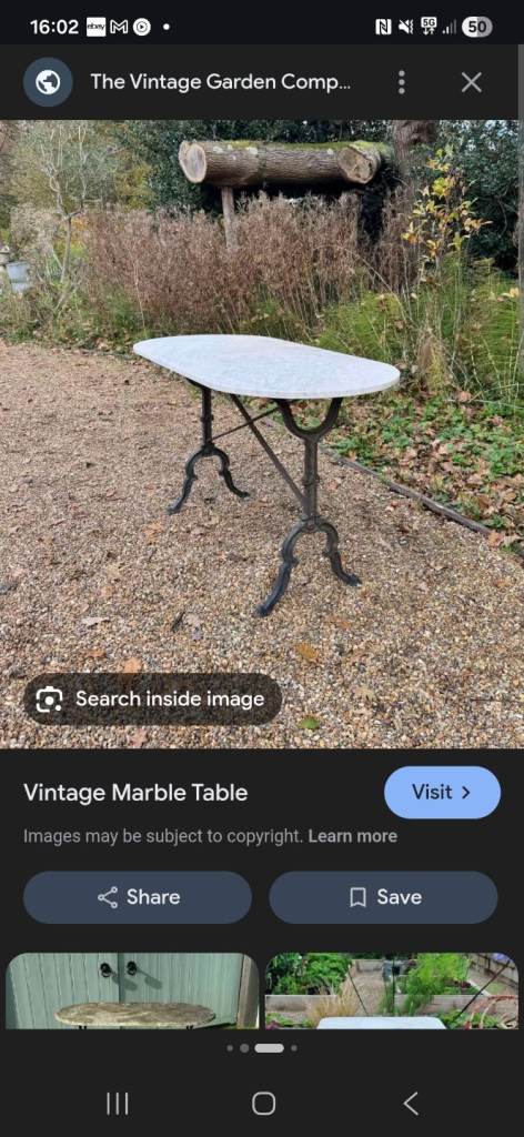 White marble table with cast iron legs