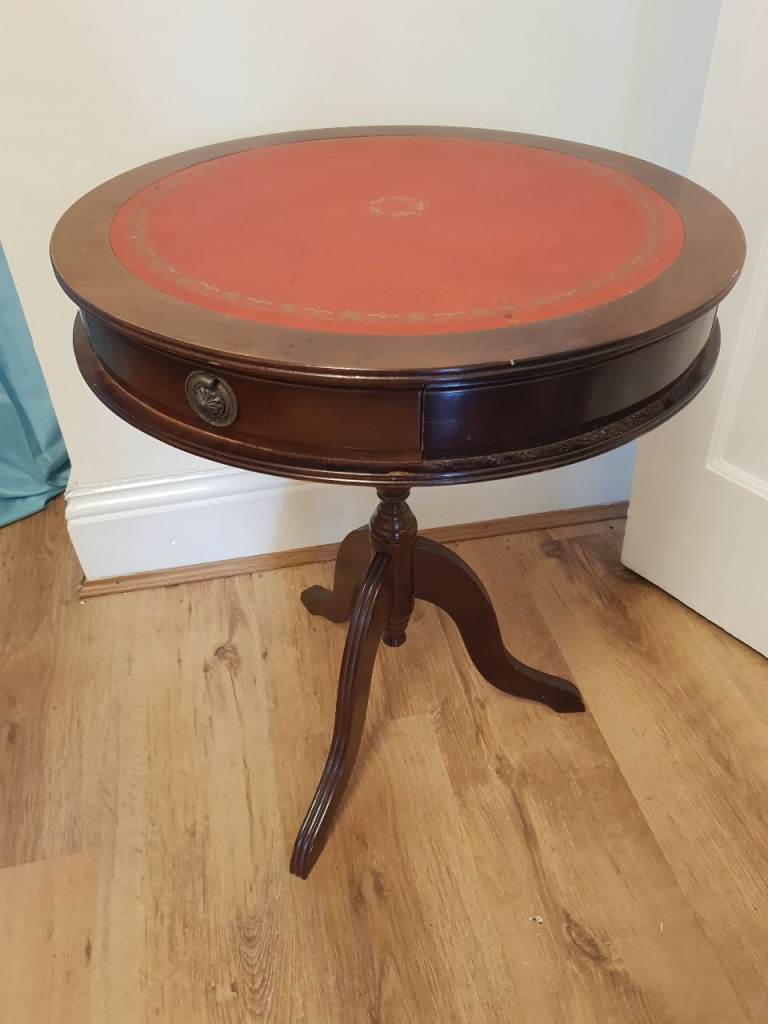 Drum Table with red leather top and 3 drawers