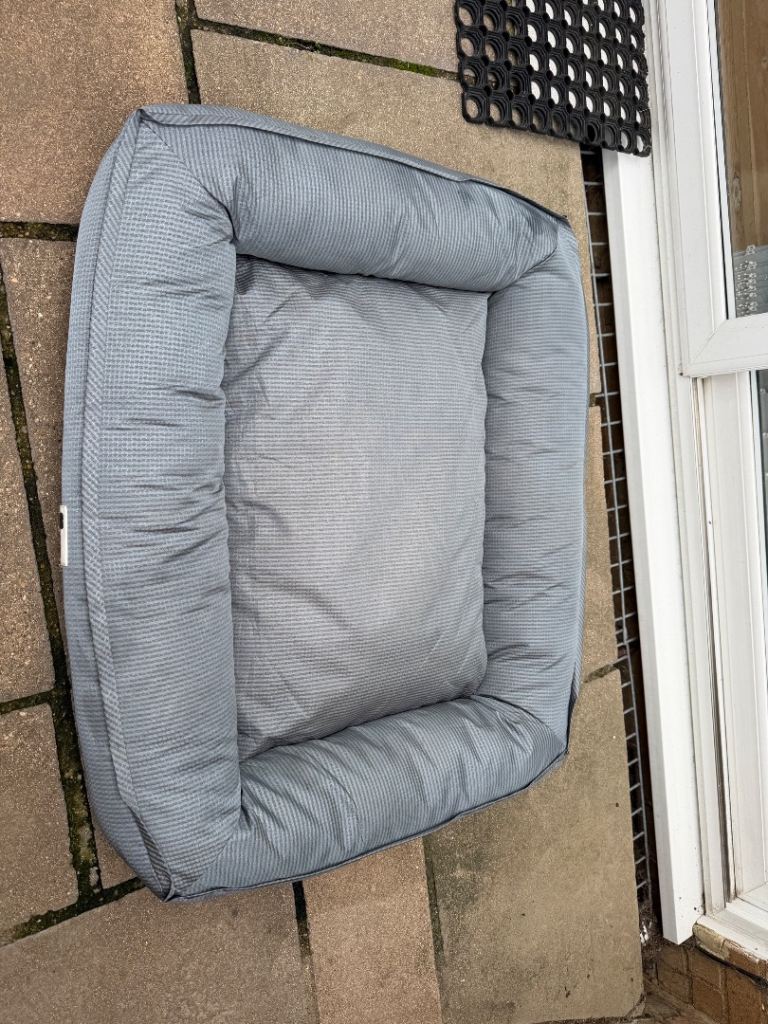 Grey rectangular pet bed with soft padded sides funny fuzzy 