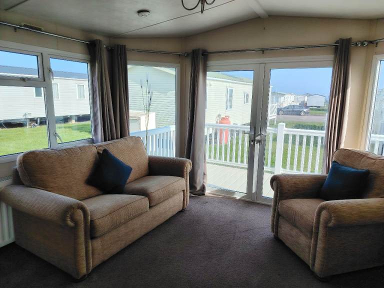 FOR SALE - CHEAP CARAVAN WITH DECKING