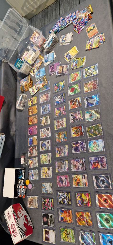 Large Collection of Pokémon Trading Cards & Packs – Good Condition