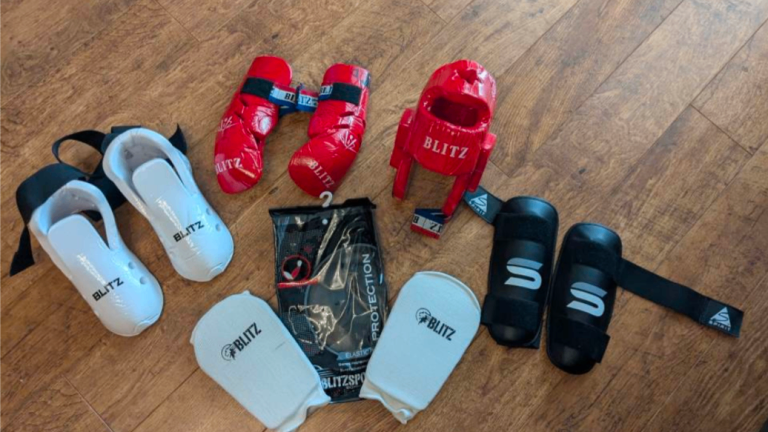Child Blitz martial art equipment including helmet, boots, shin pads, gloves