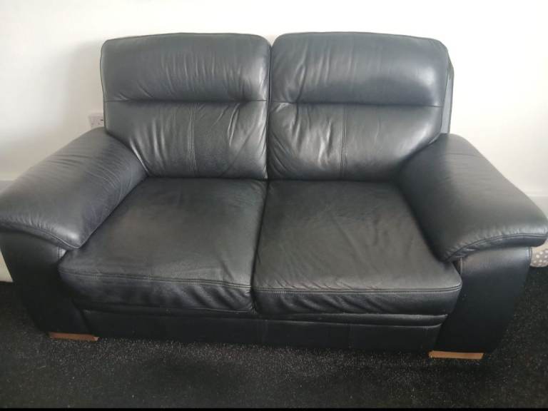 Black Leather Two-Seater Sofa – Good Condition