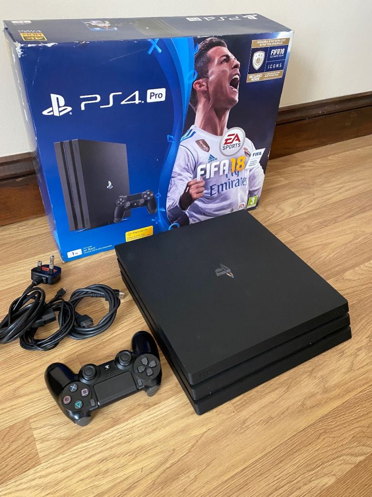 PS4 pro console 1TB with remote- boxed