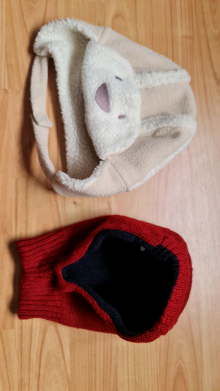 Beige & Cream coloured winter hat and red & black winter cap - clothes / clothing